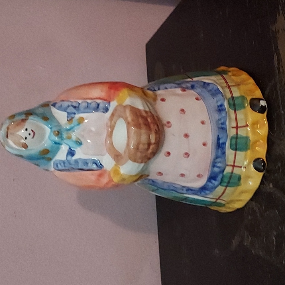 Vtg. Ceramic Peasant Lady Carring a basket candle holder